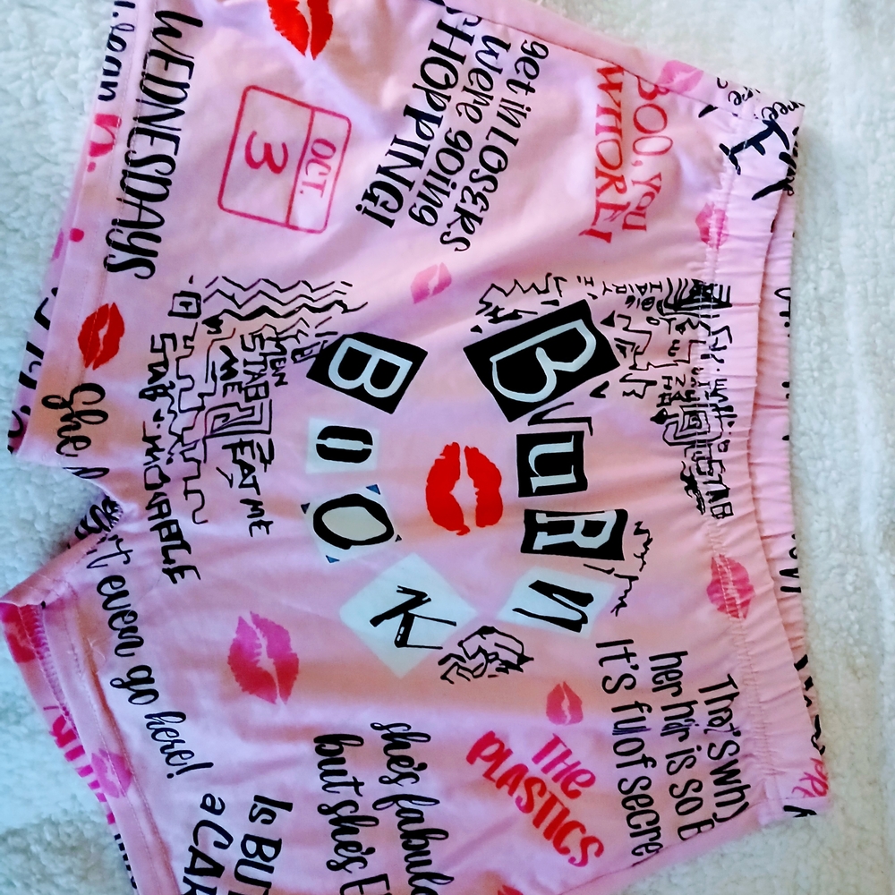 Pink Athletic Shorts with Graphic Prints and Playful Design